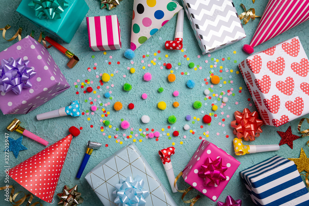 Obraz premium Happy birthday party background. Greeting card with colorful party accessories. Happy birthday greeting card. Top view