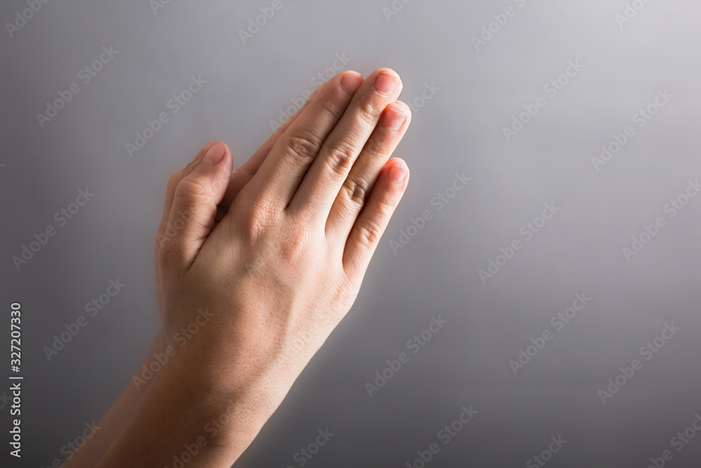 Child hold his hands for pray