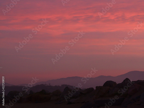 Red sunset on a hilly landscape
