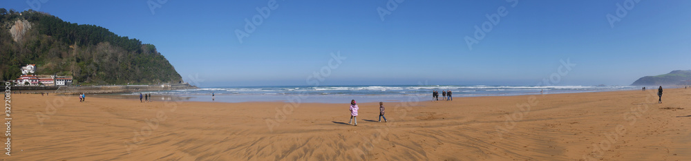 Panoramic of two children looking at Sebastian bay Panoramic of two children looking at Sebastian bay