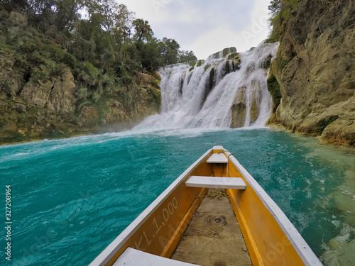yellow boat point of view (EL SALTO-EL MECO) blue river water and boating photo