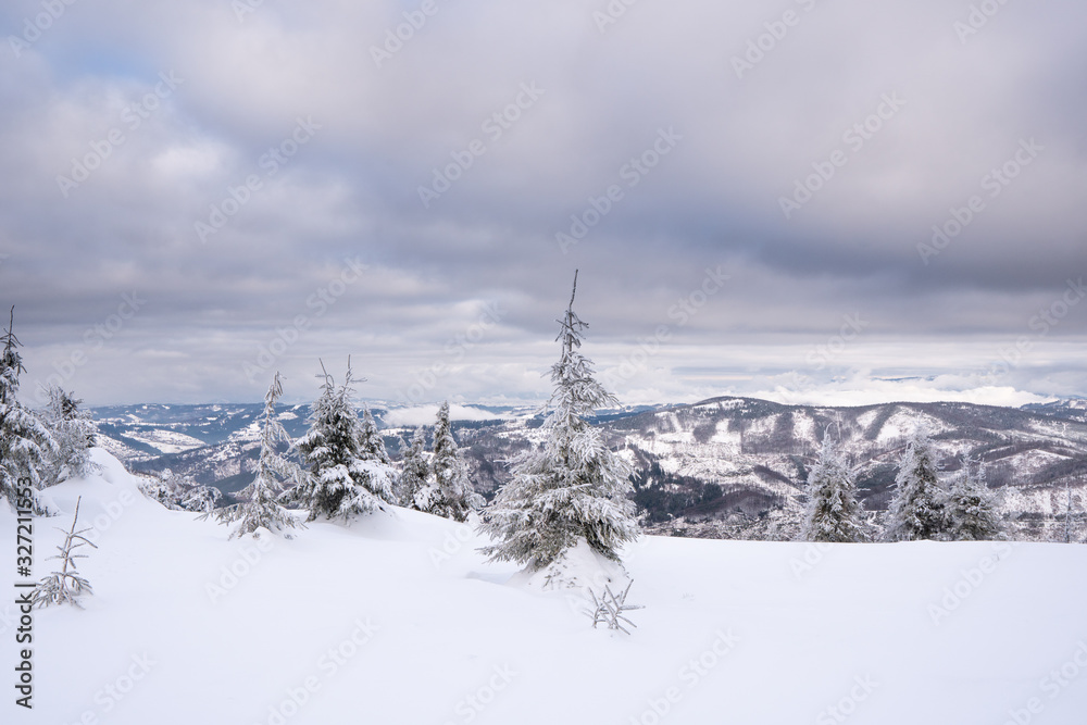Beautiful view of winter hills covered with snow in Beskydy Mountains, Slovakia Beskid Mountains Beautiful view of winter hills covered with snow in Beskydy Mountains, Slovakia Beskid Mountains