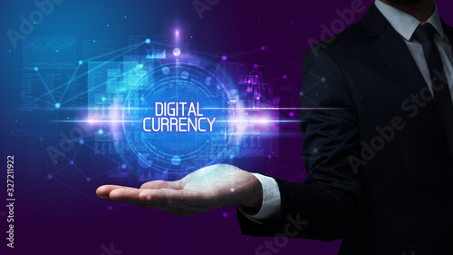 Man hand holding DIGITAL CURRENCY inscription, technology concept