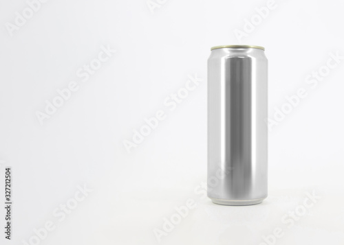 Aluminum soda can on white background. Photograph of blank aluminum soda or alcohol drink can for mockup isolated on white background with shadow. Metallic can on background.