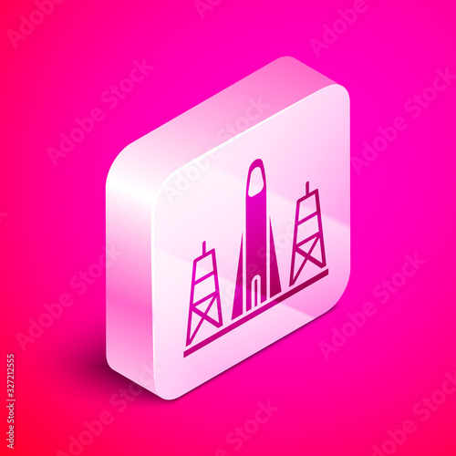 Isometric Rocket launch from the spaceport icon isolated on pink background. Launch rocket in space. Silver square button. Vector Illustration