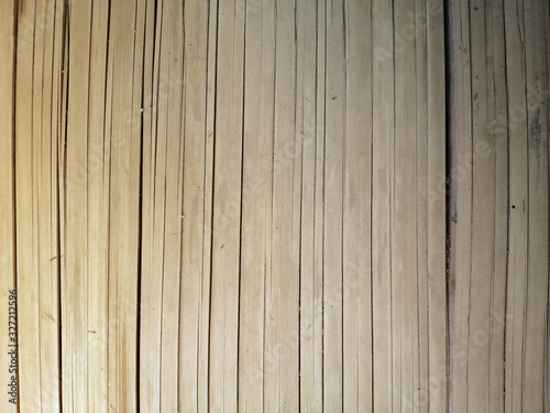 Fototapeta Naklejka Na Ścianę i Meble -  old brown tone bamboo plank fence texture for background. vintage dry Bamboo wall background.