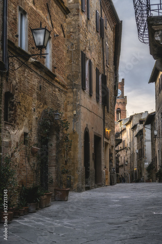 Fototapeta Naklejka Na Ścianę i Meble -  Flowery streets on a rainy spring day in the small magical town of Pienza, Tuscany.