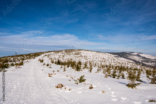 Fototapeta Naklejka Na Ścianę i Meble -  Winter landscape in mountains at sunshine day with beautiful clouds, Poland Beskids Scrzek