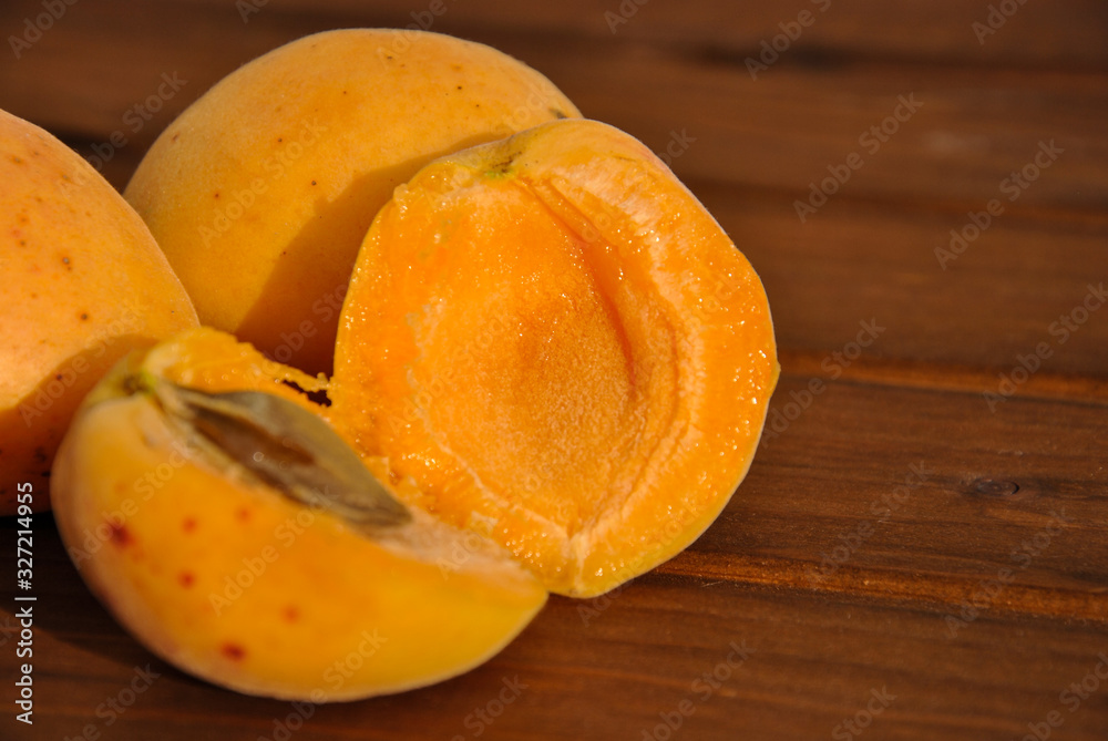  apricot on a wooden background