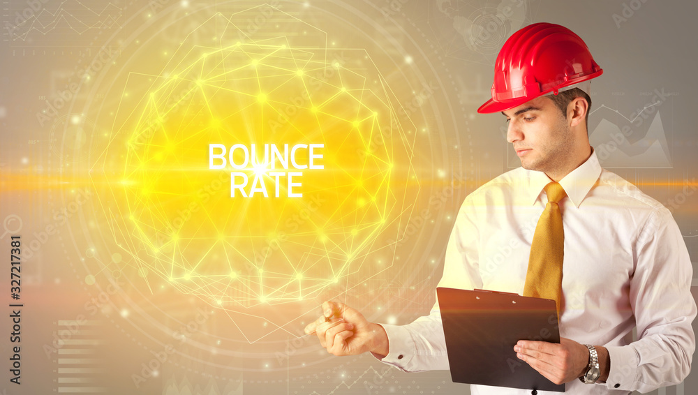 Handsome businessman with helmet drawing BOUNCE RATE inscription, social construction concept