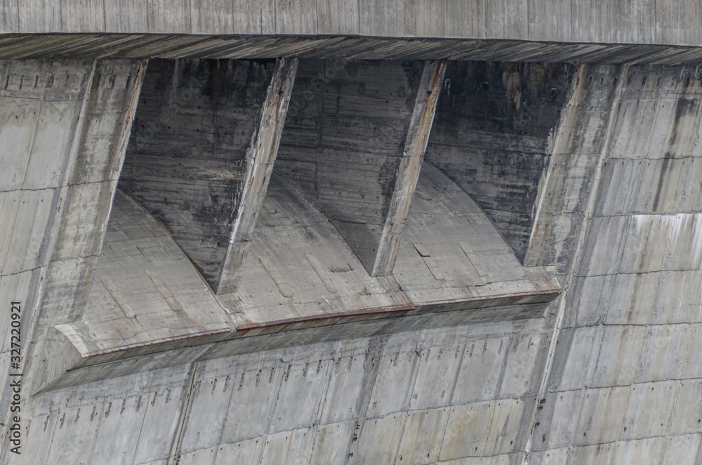Concrete construction that is detail element of a dam, representation of the watercourses in case of emergency. Concrete construction that is detail element of a dam, representation of the watercourses in case of emergency.