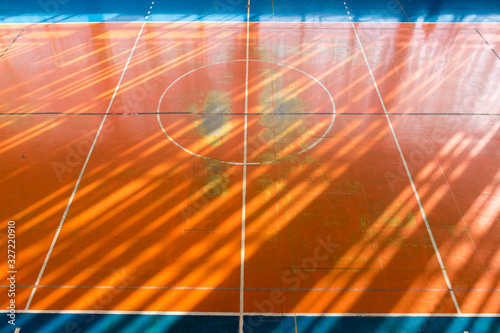Fototapeta Blue-orange gym floor. Gym for football, basketball
