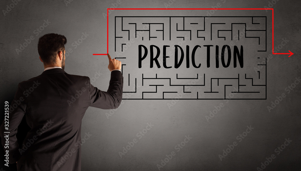 businessman drawing maze with PREDICTION inscription, business education concept businessman drawing maze with PREDICTION inscription, business education concept