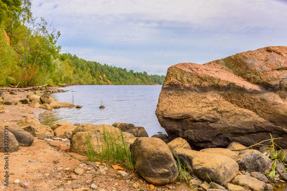 Sandy Bank of the river with large stones Sandy Bank of the river with large stones