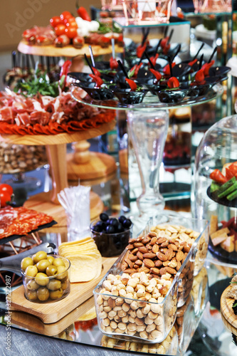 Snack for alcoholic beverages on the buffet table photo