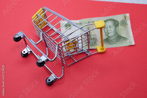empty basket without food and one Chinese yuan