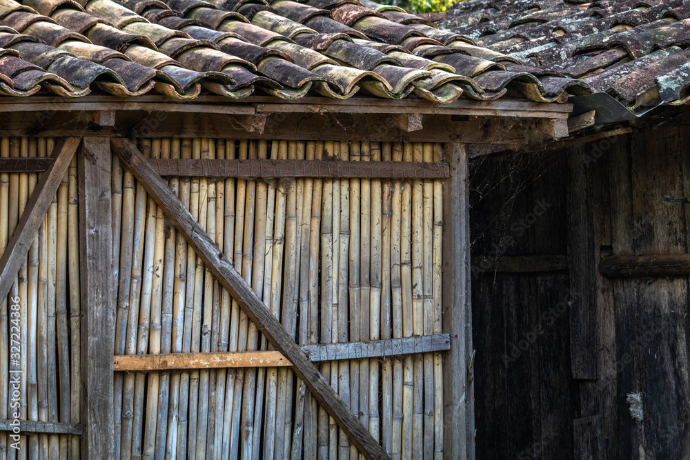 Naklejka premium Hut built of wood on a rural property in the interior of Brazil.