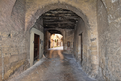 Sant Agata de  Goti  Italy  02 29 2020. A narrow street between old houses of a medieval village.