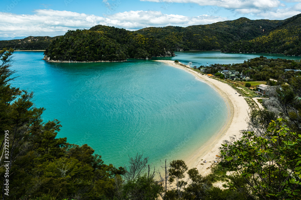 tropical beach by the sea in abel tasman national park