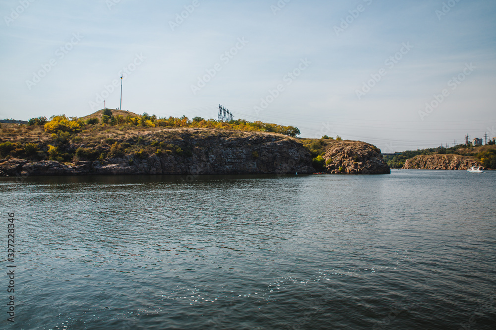 Rocky riverbank. Khortytsia - largest island in the River Dnieper located in the city Zaporizhia, Ukraine Rocky riverbank. Khortytsia - largest island in the River Dnieper located in the city Zaporizhia, Ukraine