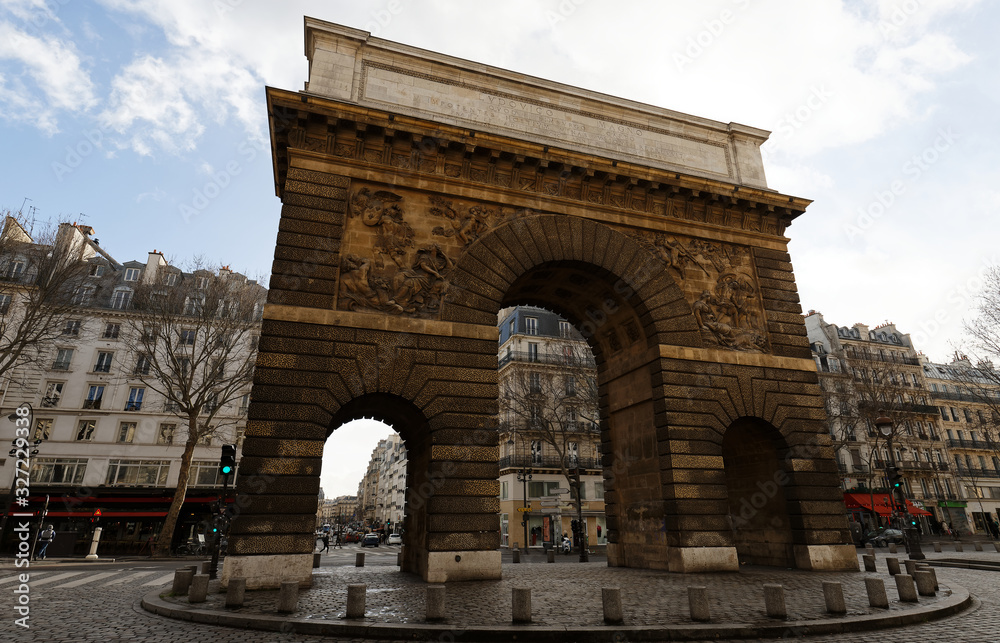 Paris, the porte Saint-Martin, beautiful ancient gate near the Grands Boulevards.