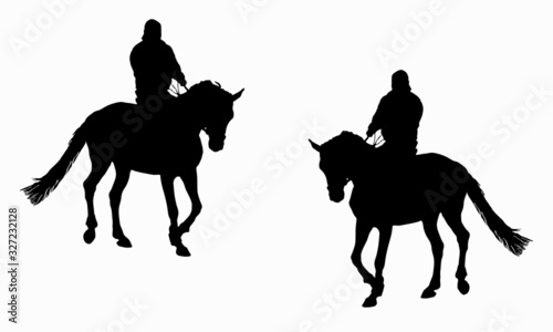 man riding a horse, two isolated black silhouettes on a white background