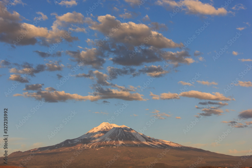 Distant view of Mt Shasta at dusk