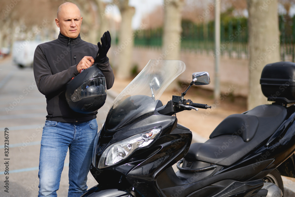 Handsome rider guy racer motorcycle. Handsome rider guy racer motorcycle.
