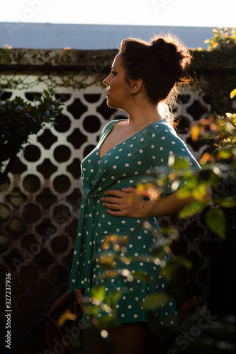 young woman in blue dress