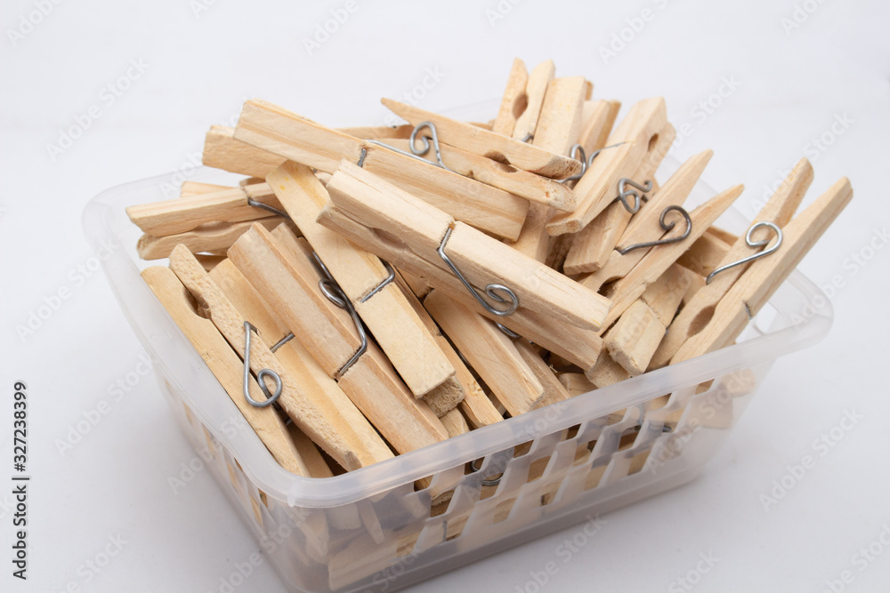 A clothespin or clothes peg is used to hang up clothes for drying, normally on a clothes line. Clothespins often come in many colors and different designs. Can be in plastic or wooden