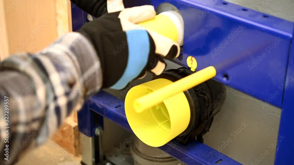 Plumber Connects Water Pipes And Fittings Adjusts Connections Tightens Loose Pieces. Plumber Connects Water Pipes And Fittings Adjusts Connections Tightens Loose Pieces.
