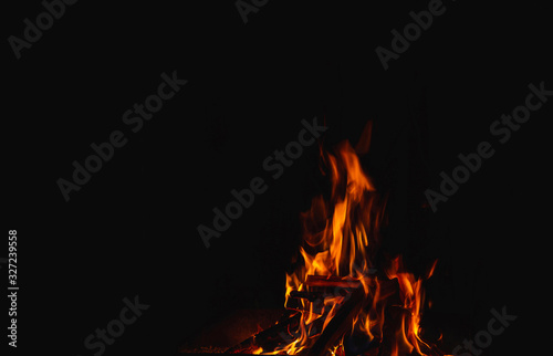 flame, burning wood giving heat and light