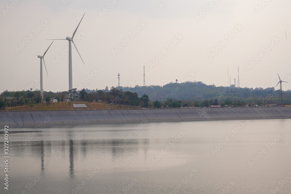 wind turbines at sunset