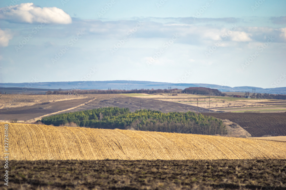 Fototapeta premium Plowed field in autumn day
