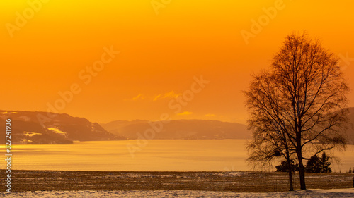 Dramatic light over a fjord in norway, Trondheim , Orkanger photo