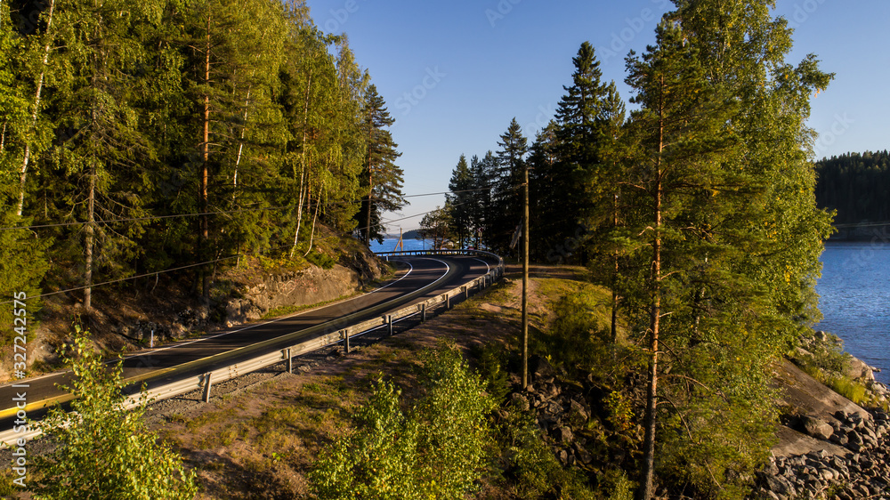 Aerial survey of the shore of Lake Ladoga in sunny weather. Aerial survey of the shore of Lake Ladoga in sunny weather.