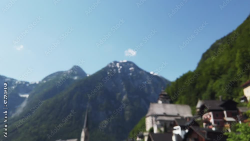 HALLSTATT, AUSTRIA june 02, 2019: The Hallstatt travel video of town , lake and moutain t.The alpine slopes and clear sky on summer. HALLSTATT, AUSTRIA june 02, 2019: The Hallstatt travel video of town , lake and moutain t.The alpine slopes and clear sky on summer.