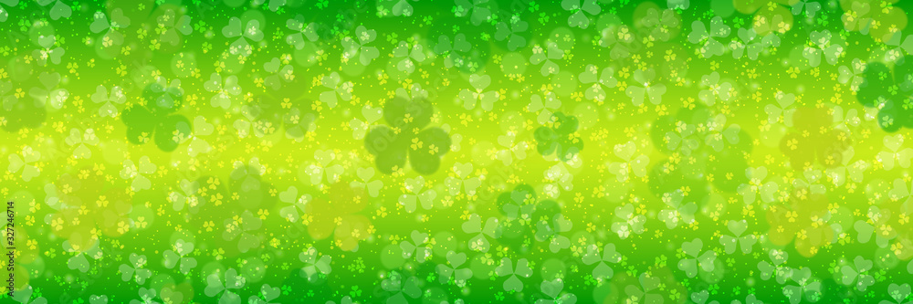St.Patrick's Day green vector banner with clover leaves and light effects St.Patrick's Day green vector banner with clover leaves and light effects