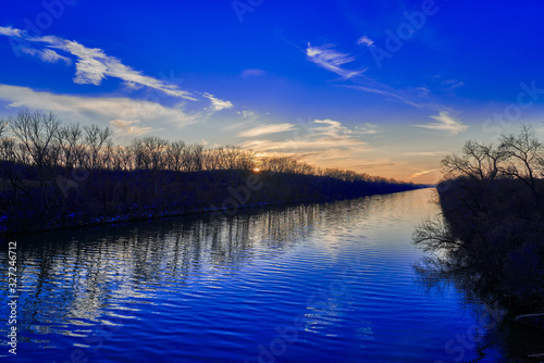 Illinois River at sunset with Dark Blue Skys and with blue reflection on River 