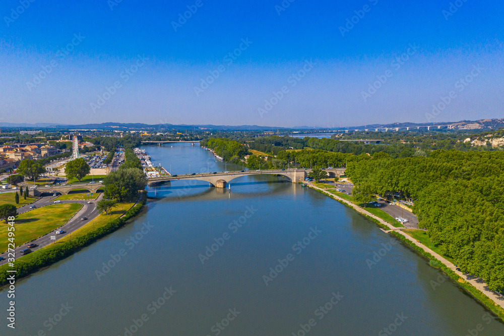 Avignon city and Rhone river under summer blue sky Avignon city and Rhone river under summer blue sky