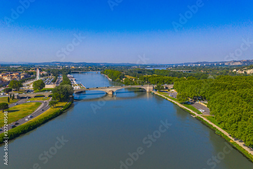 Avignon city and Rhone river under summer blue sky