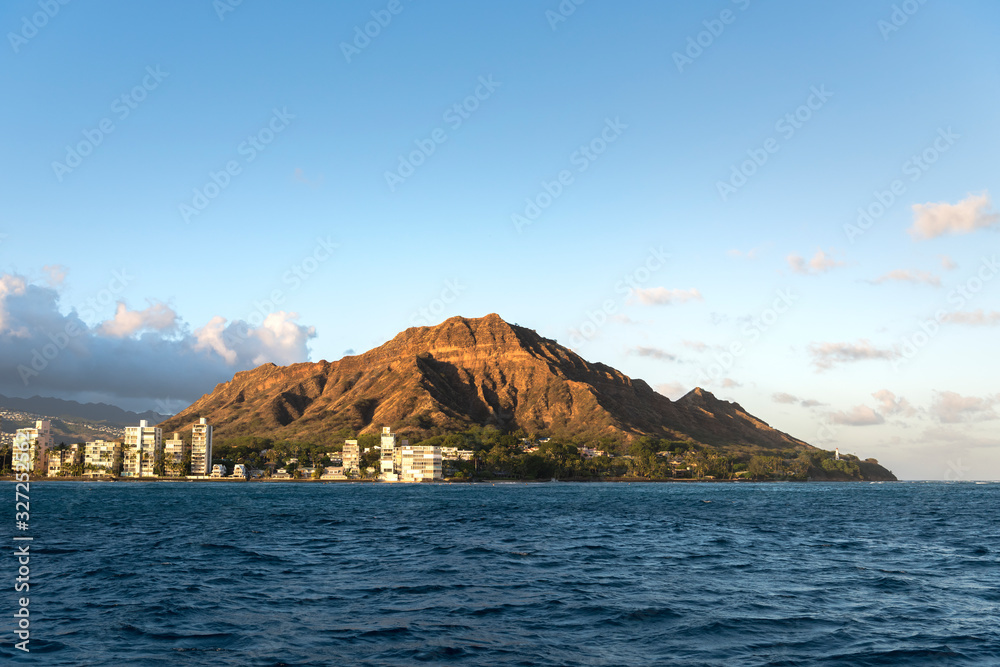 View of Honolulu from a boat at sunset, Oahu Hawaii 