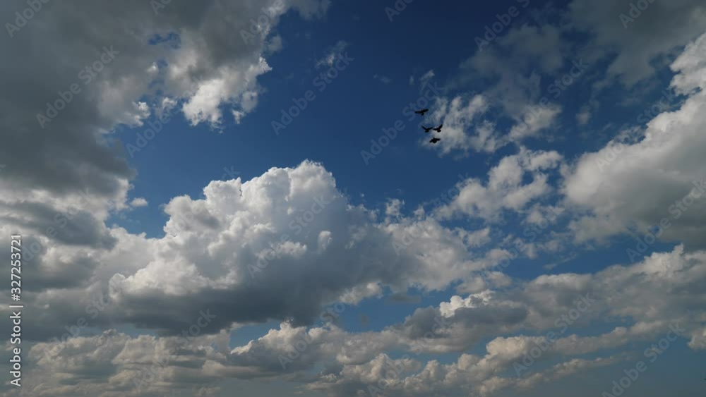 Fluffy cumulonimbus clouds on blue sky Fluffy cumulonimbus clouds on blue sky