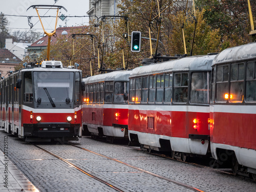 Lines of trams queuing during a rush hour in a city center of a Central European capital city. Tramway is a very common commuting transit system in many urban systems of Europe.