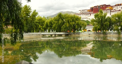 4k Potala reflection on lake in Lhasa park-Tibet.lake with willow. photo