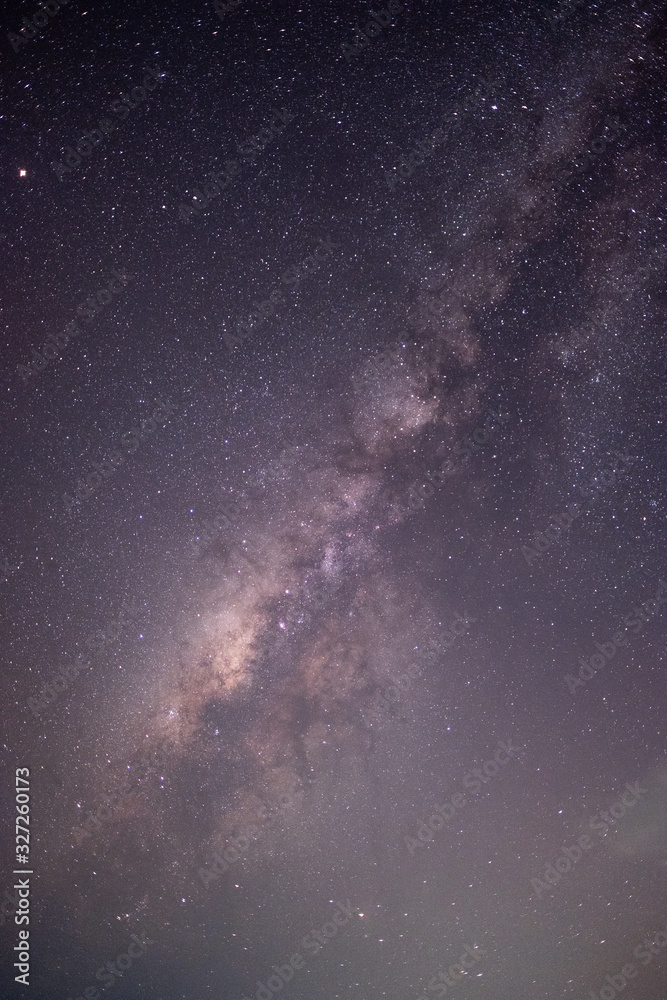 The stars and the milky way in the dark sky at night are very beautiful.