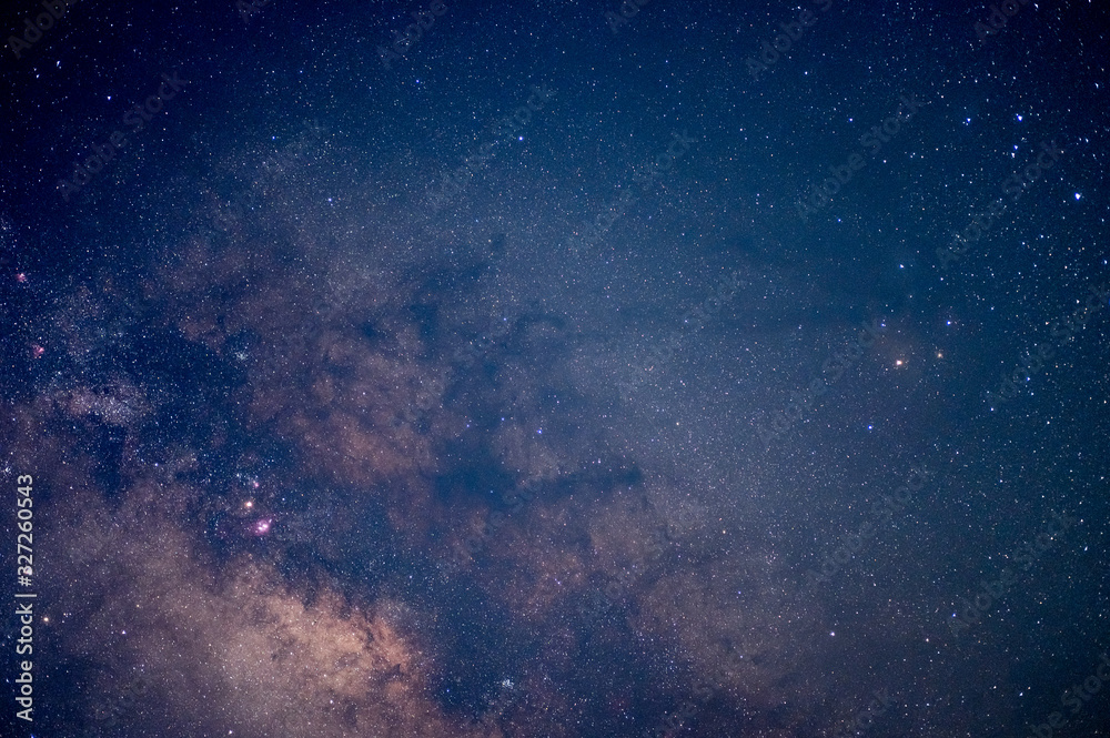 The stars and the milky way in the dark sky at night are very beautiful.