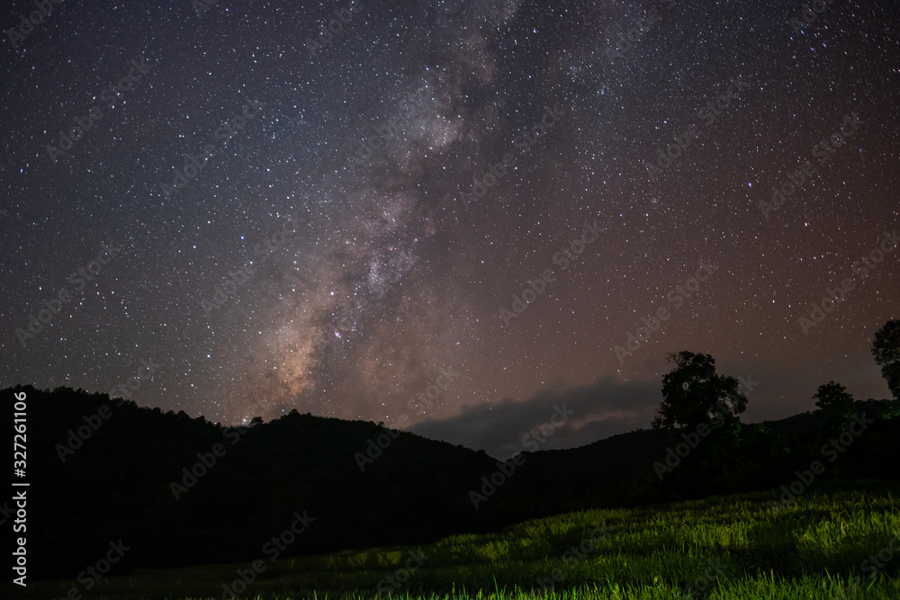The stars and the milky way in the dark sky at night are very beautiful. The stars and the milky way in the dark sky at night are very beautiful.