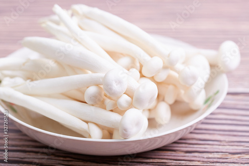 Fresh white mushrooms on a plate