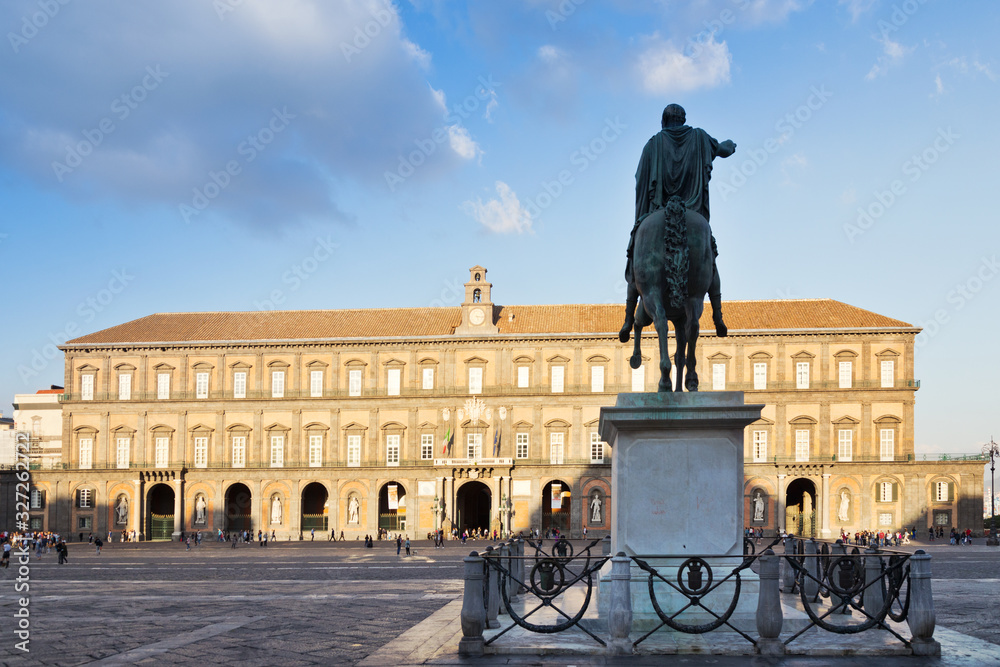royal palace Palazzo Reale, statue of Ferdinando I on Piazza del Plebiscito square, Naples, Italy